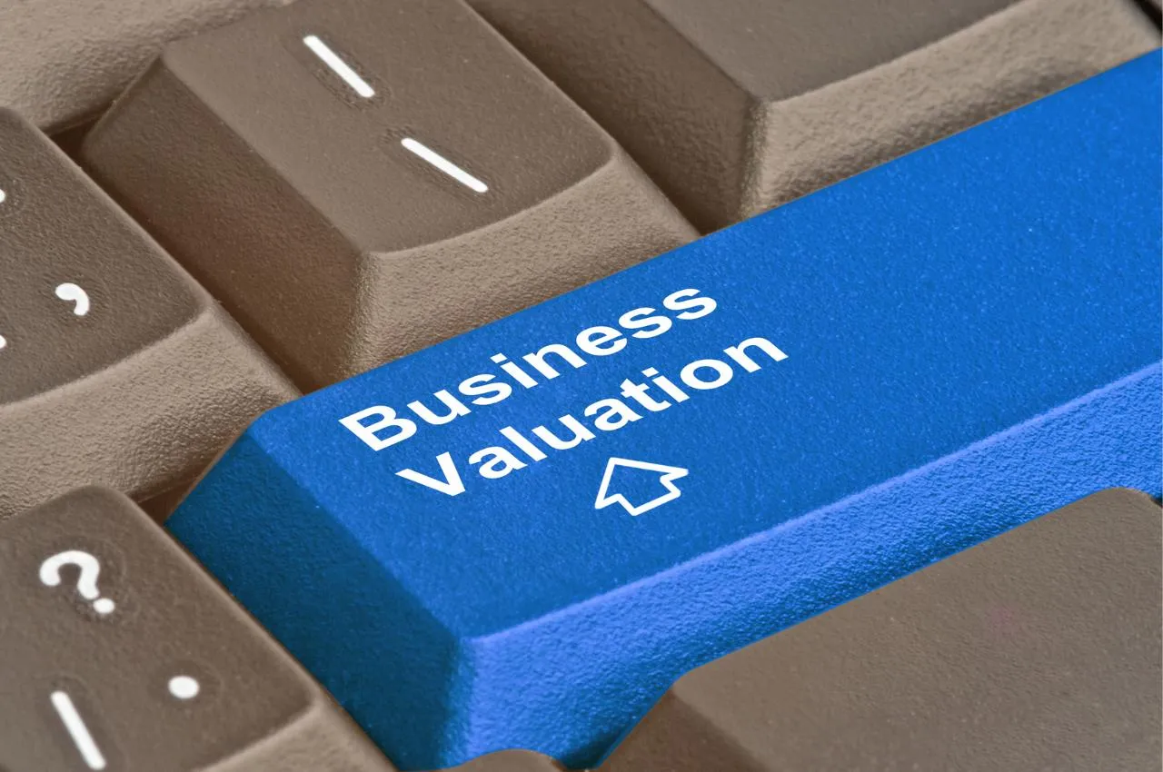 Botón azul del teclado: Valoración de empresas. Guía para la valoración de empresas.